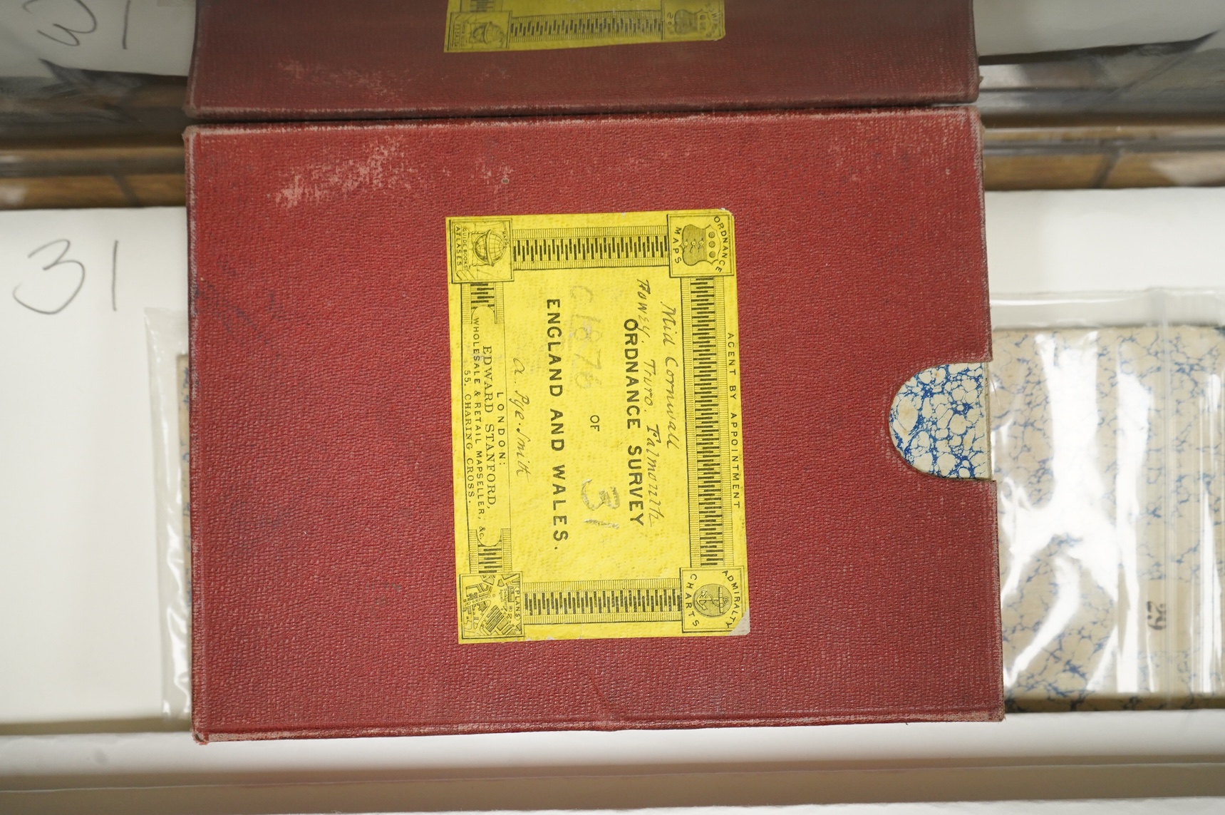 Ordnance Survey maps of Cornwall and part of Lundy, comprising of a set of six engraved maps mounted on linen and edged with blue cotton, including sheet no.s; 28, 29, 30, 31, 32 and 33, engraved by Benjamin Baker at the